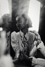 Load image into Gallery viewer, Fine Art Photography 'Echoing Heart' - A striking black and white portrait reflecting a woman in ruffled attire, showcasing the depth of emotions captured in this limited edition photography.