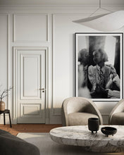 Load image into Gallery viewer, Fine Art Photography 'Echoing Heart' displayed in a modern living room, highlighting the elegance of limited edition photography as a centerpiece within stylish interior design.