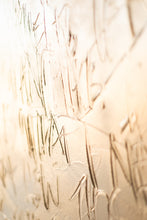 Load image into Gallery viewer, Side view of 'Let Go' contemporary art piece, highlighting the rich golden texture and artistic inscribing evident from the side.