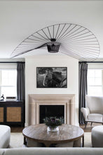 Load image into Gallery viewer, Stylish living room with framed black and white Horse Wall Art hanging above a modern fireplace, featuring elegant decor elements and a cozy ambiance.