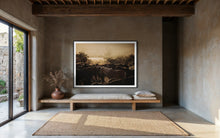 Load image into Gallery viewer, Horse Art - Limited Edition &#39;Horse&#39;s Flock 0225&#39; showcased beautifully in a modern interior setting, with warm tones enhancing the serene depiction of horses at dawn.
